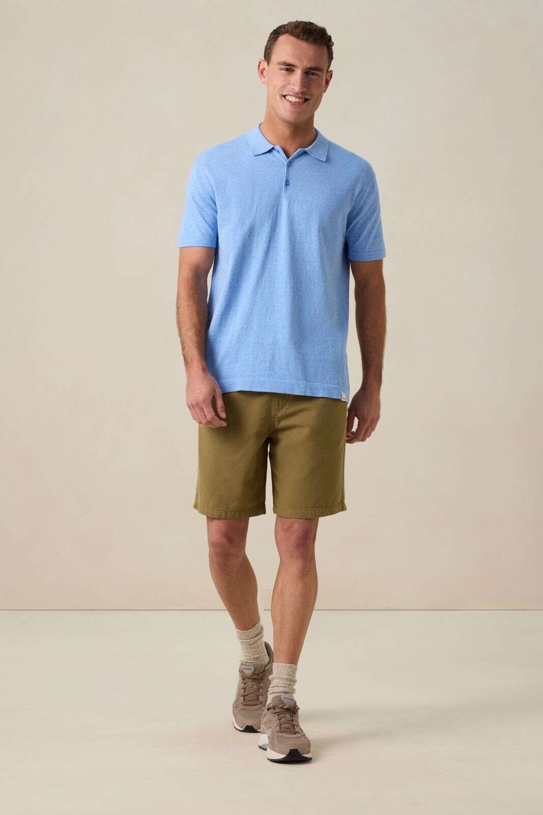 Blauwe gebreide polo