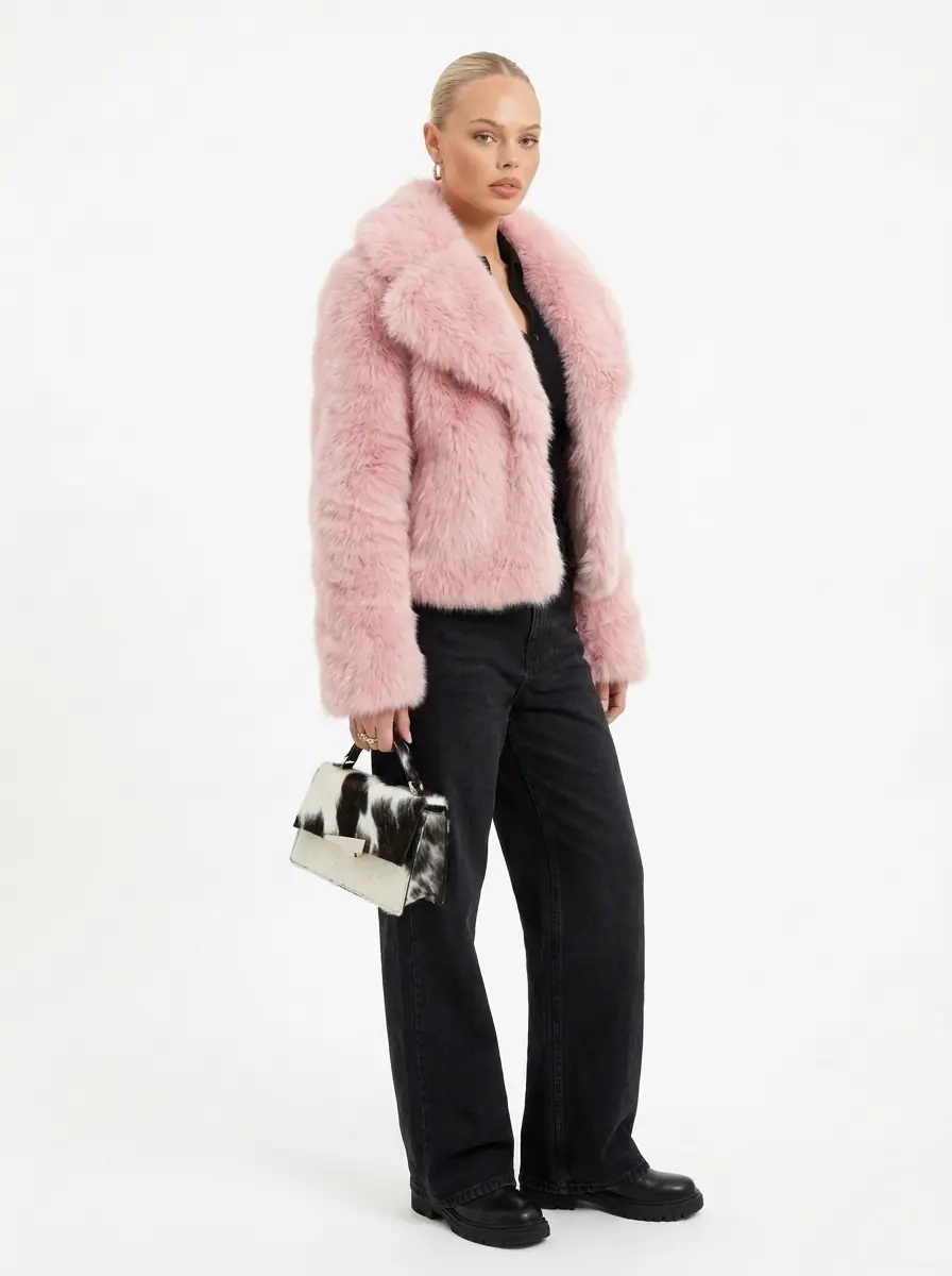 Full-length view of a woman wearing a pink faux fur jacket
