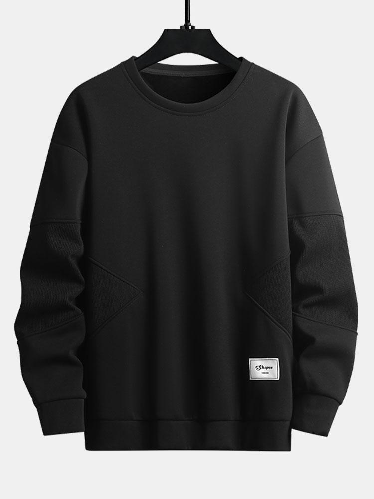 Sweat-shirt à col rond en patchwork de tissu texturé