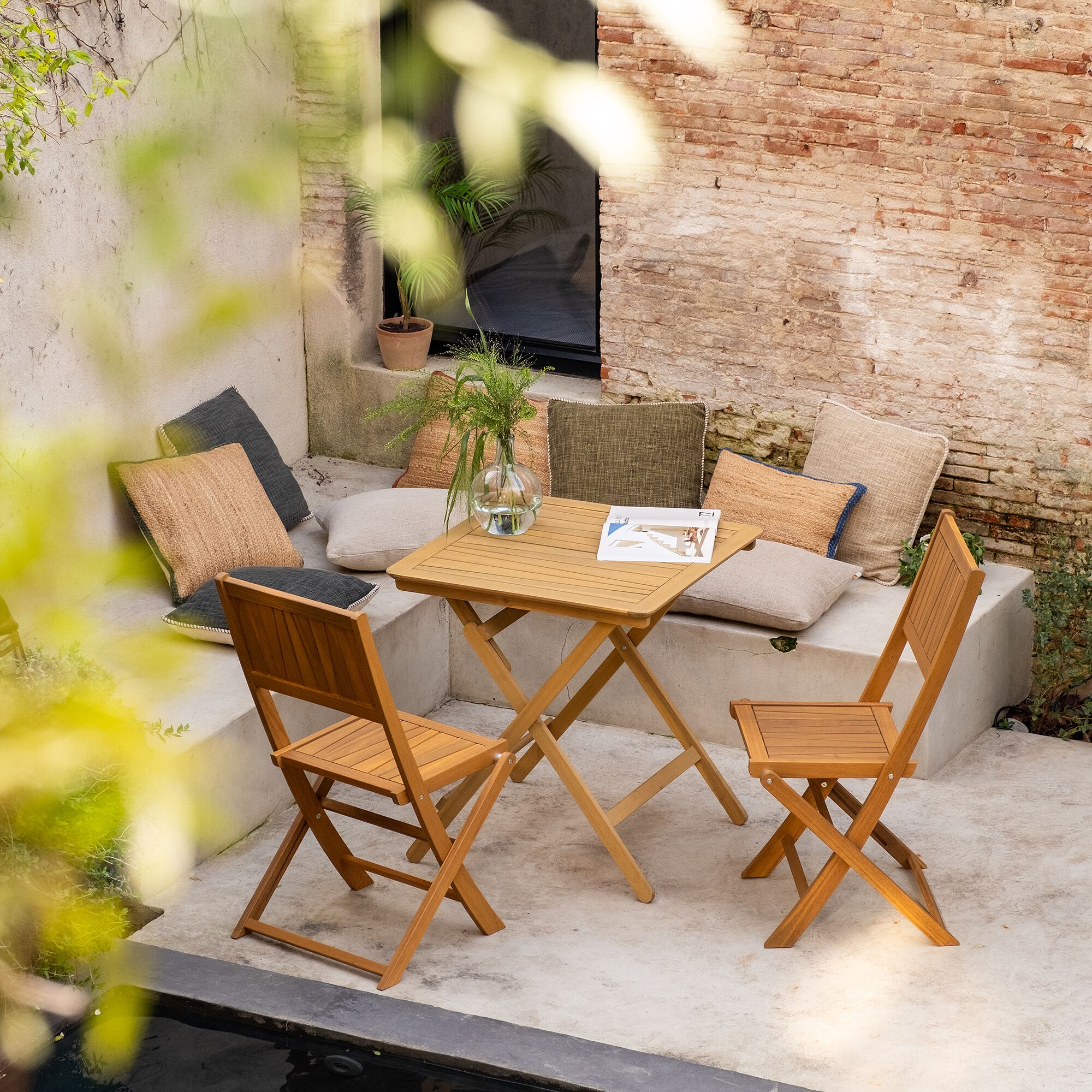 CARLOTI - Chaise de jardin pliante en acacia - bois clair