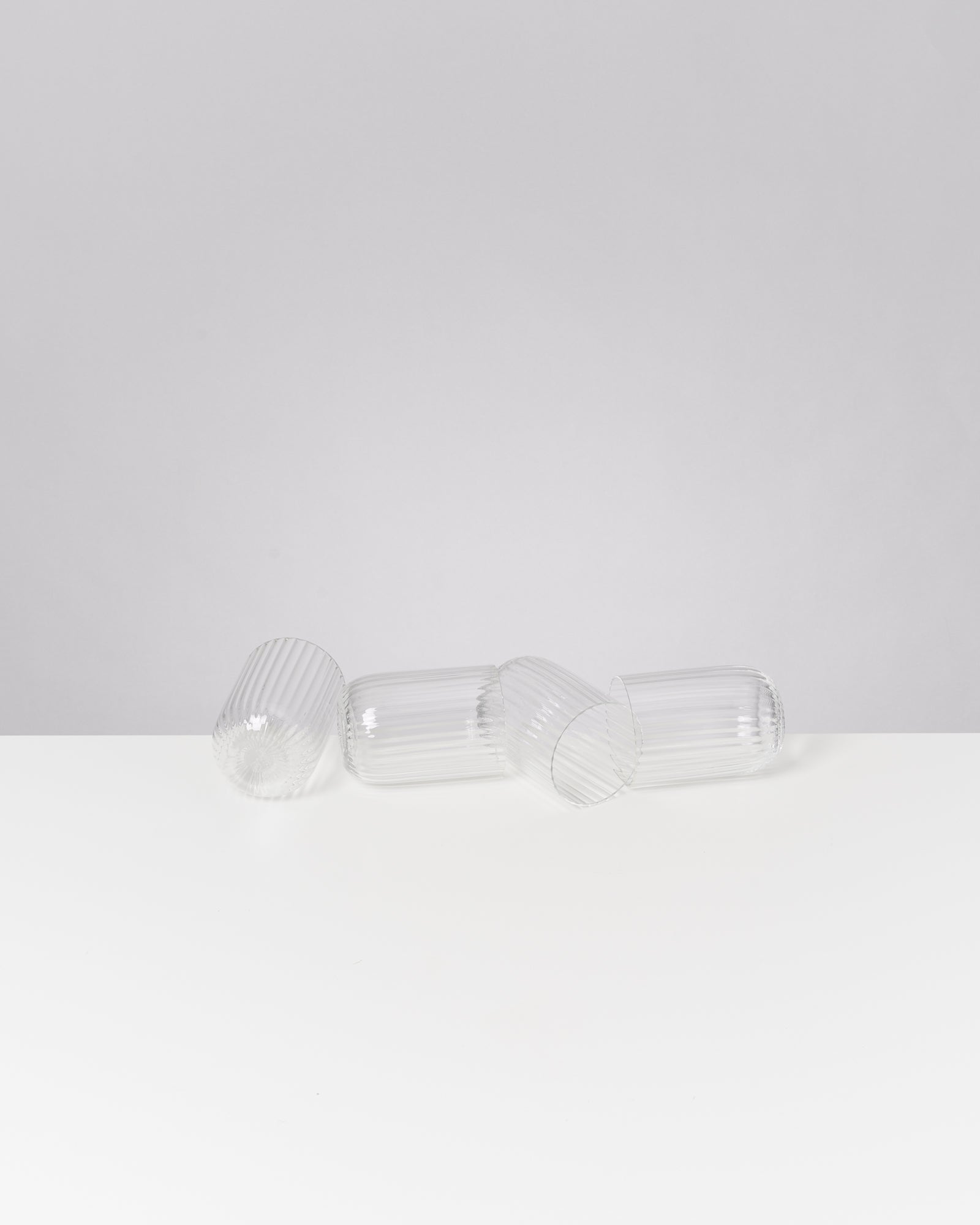 JOIA - SMALL GLASS RIFFLED TRANSPARENT SET OF 4