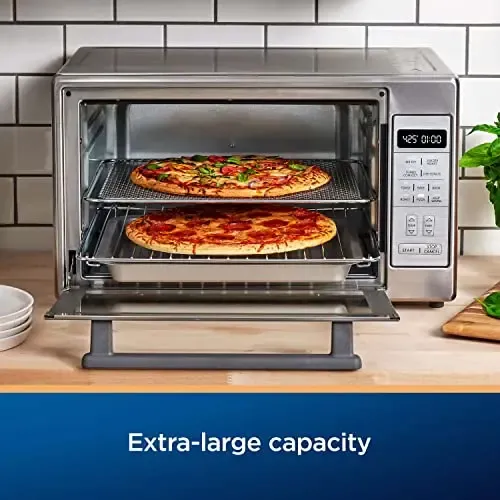 Four à air chaud extra-large Oster, 10 fonctions de cuisson polyvalentes, peut contenir 2 grandes pizzas, acier inoxydable, parfait pour recevoir pendant les fêtes.
