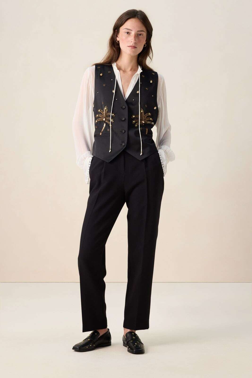 Zwart gilet met palmbomen