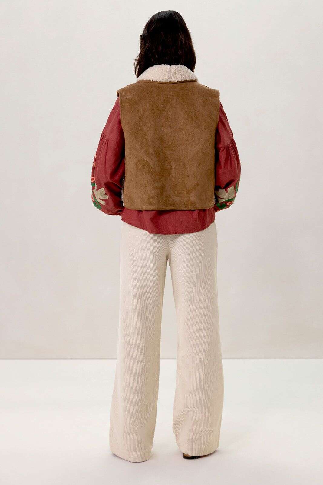 Bruin reversible teddy gilet