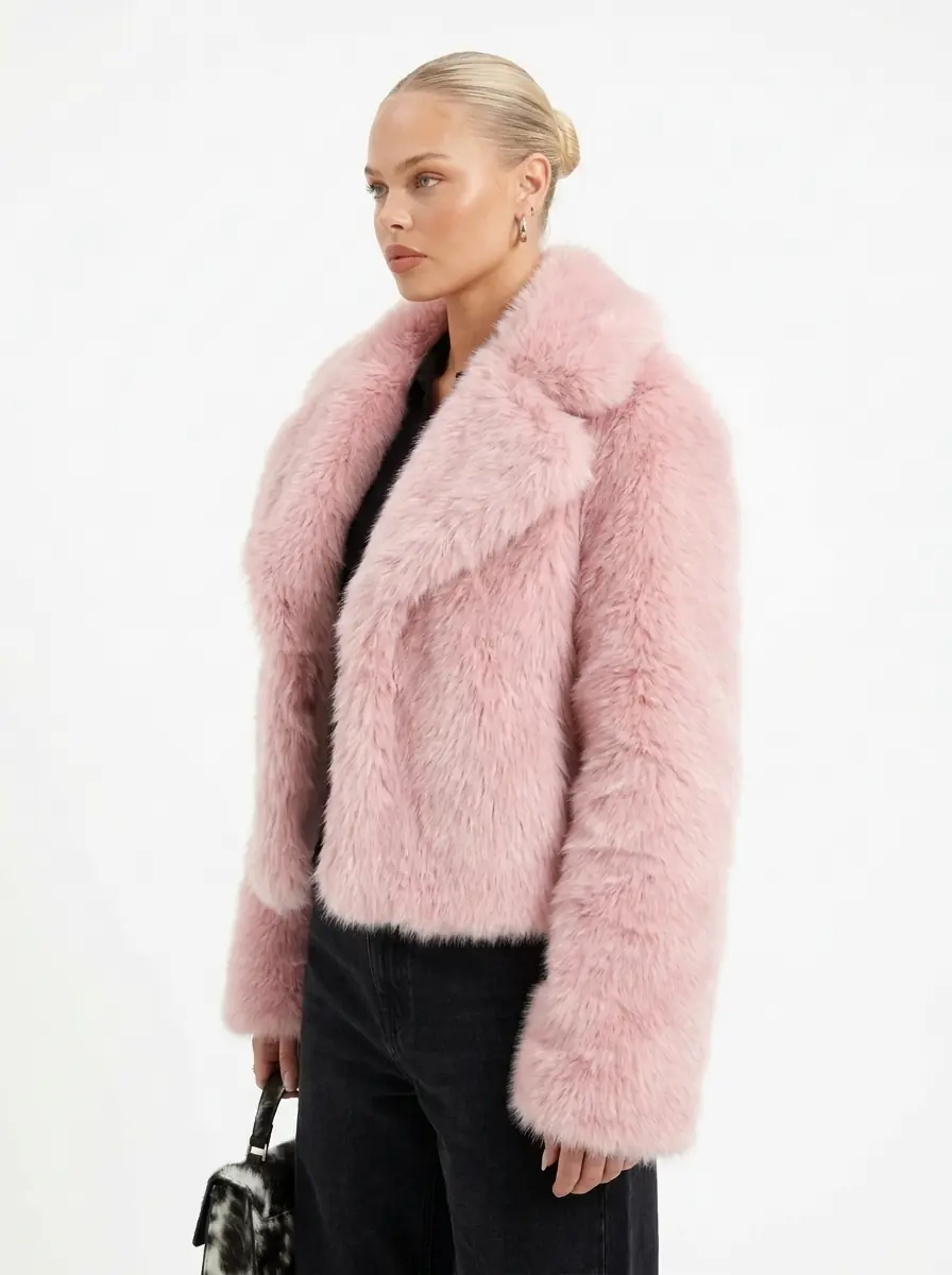 Side view of a woman wearing a pink faux fur jacket