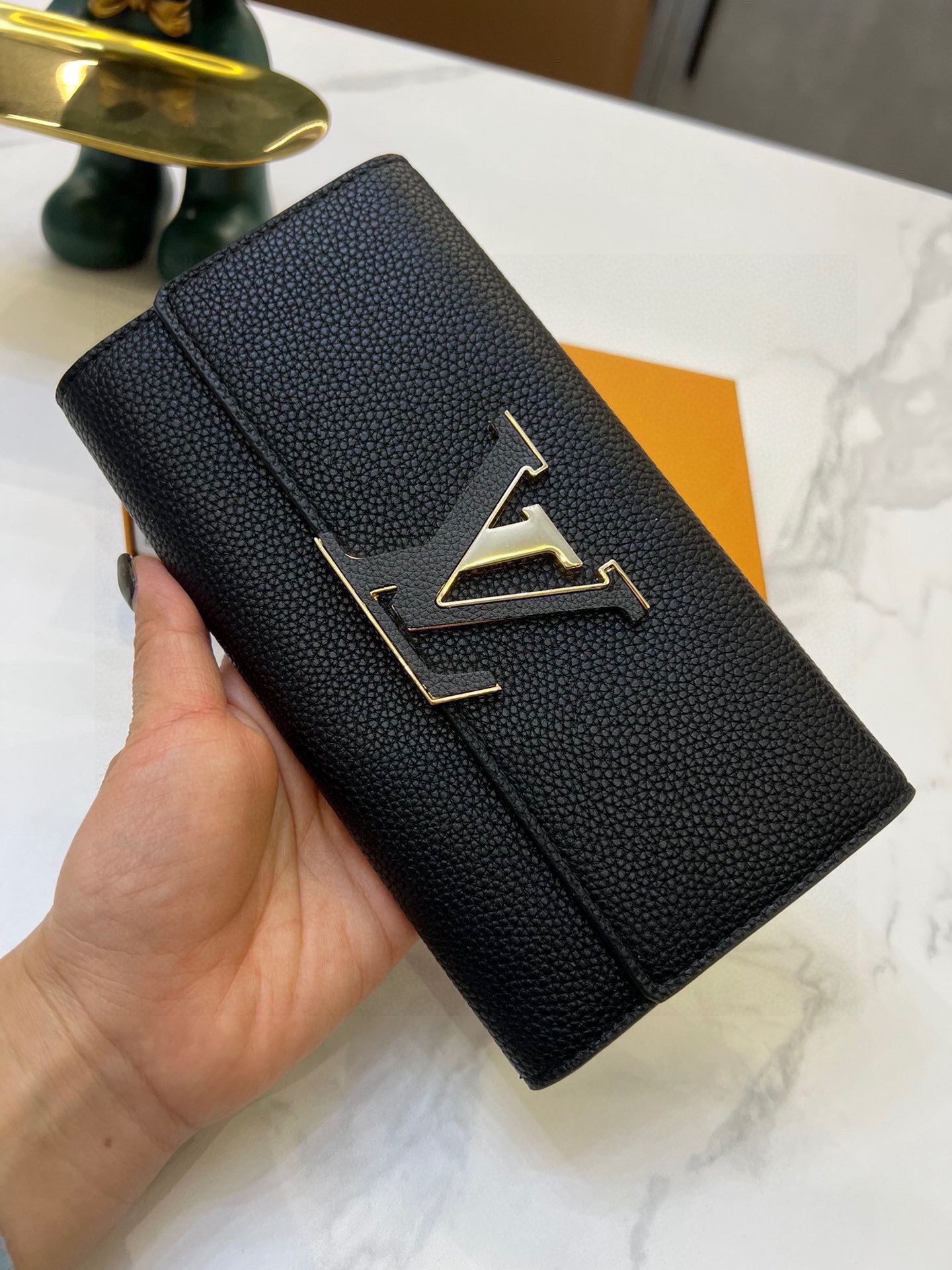 L Capucines men wallet size??20*11*2.5 cm