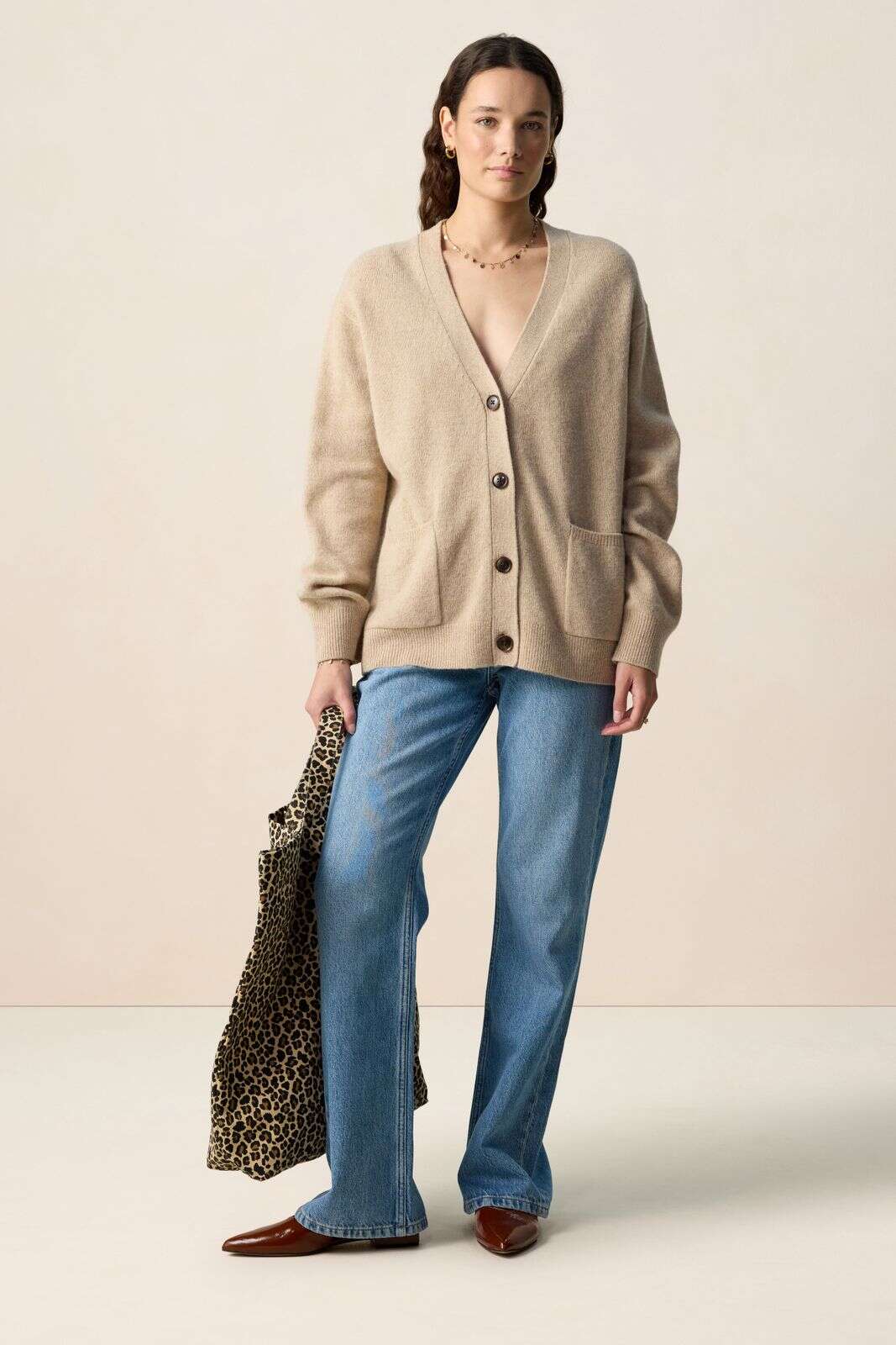 Beige vest met V-hals