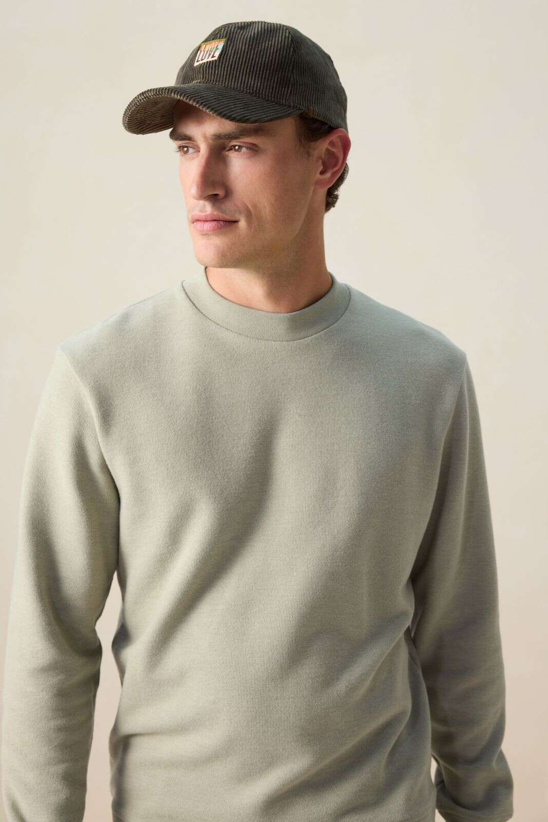 Groene corduroy pet met artwork