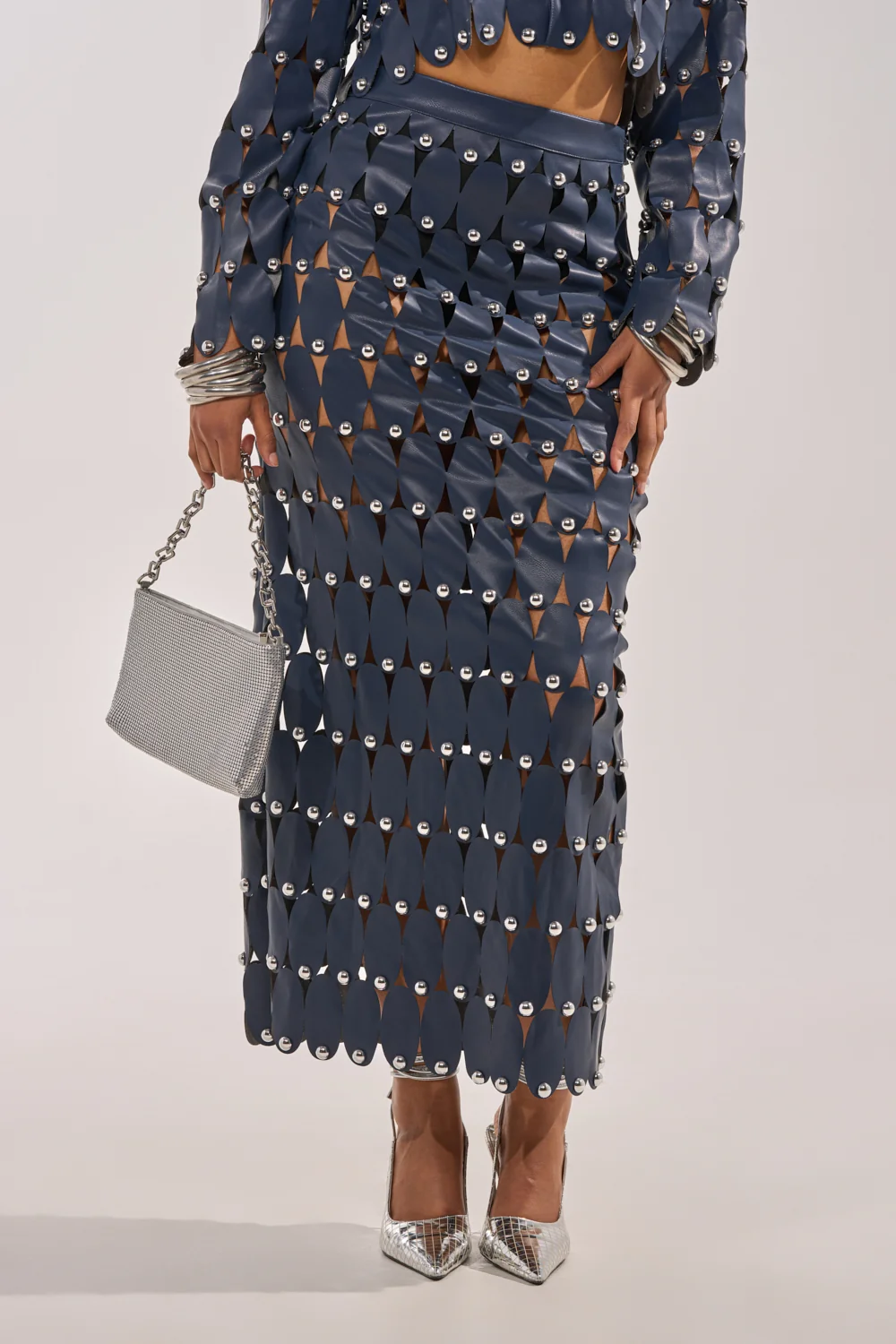 THE SNEAK PEEK STUDDED PU MIDI SKIRT IN NAVY - Akira Store