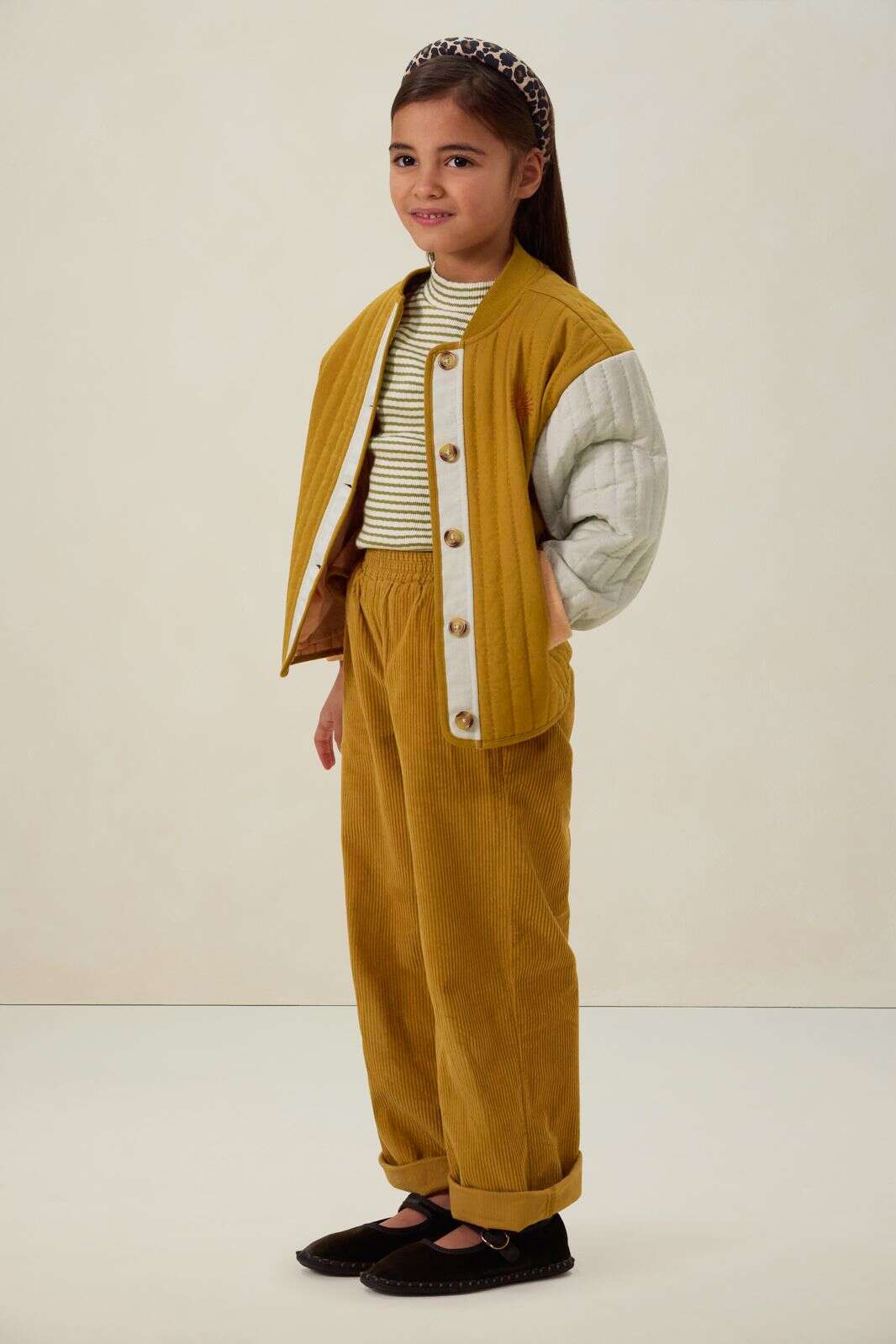 Donkergele quilted jas met embroidery