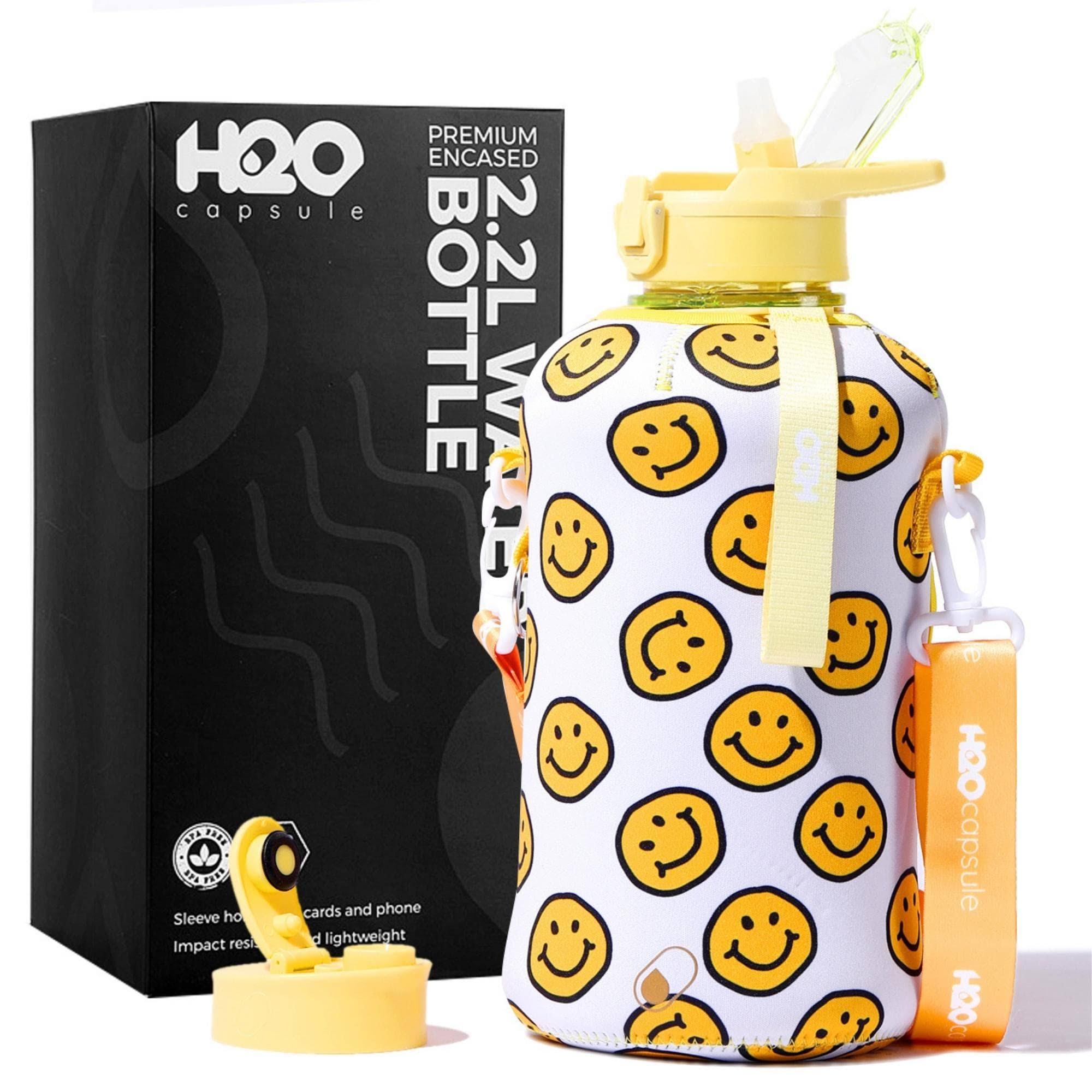 H2O Capsule 2.2L Half Gallon Water Bottle with Storage Sleeve and Covered Straw Lid ÿ BPA Free Large Reusable Drink Container with Handle - Big
