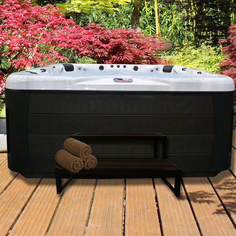 Spa carré American Spas 7 personnes, 56 jets, acrylique, avec ozonateur et haut-parleur intégré