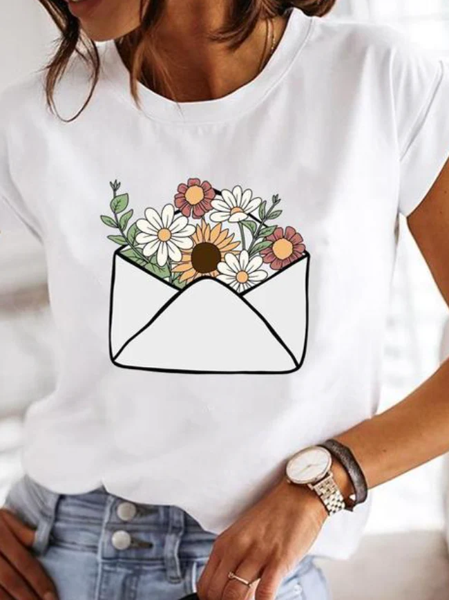 Océane Dubois | T-shirt stylé aux motifs d'été extravagants