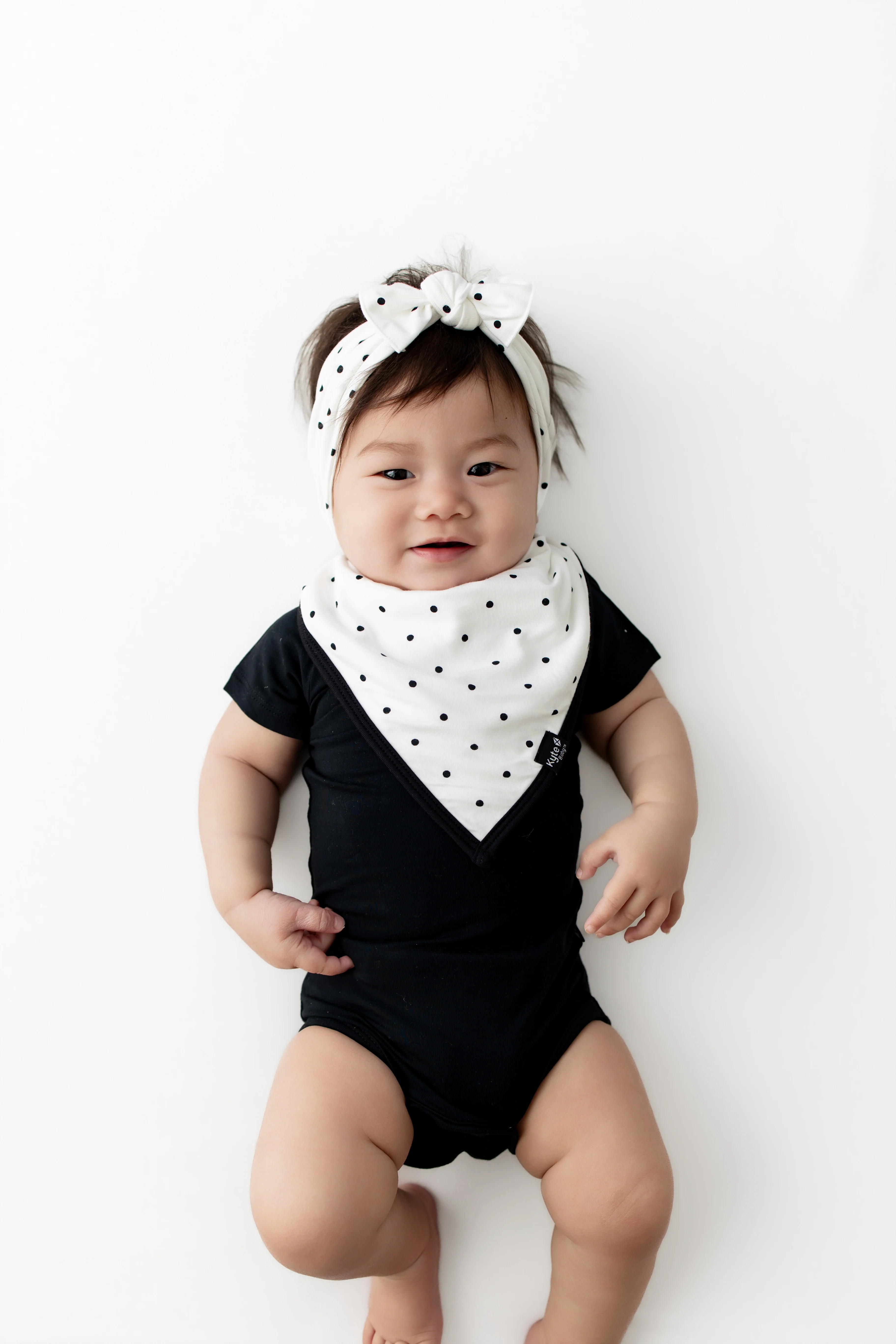 Bib in Midnight Polka Dot