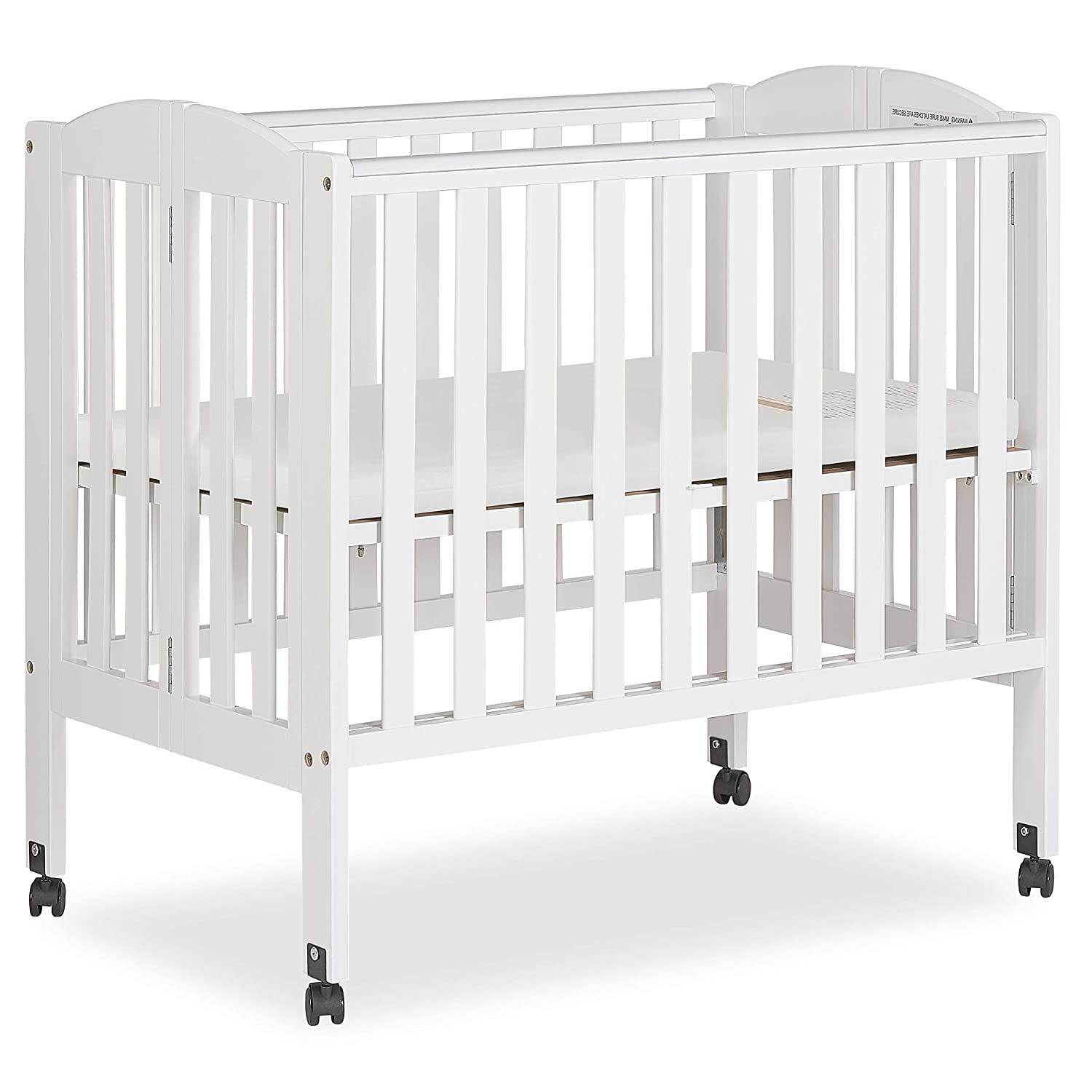 2-in-1 Folding Portable Mini Crib in White. Mattress Pad Included. Easy to Fold and Store Baby Crib. Two Adjustable Mattress Height positions Convertible Crib