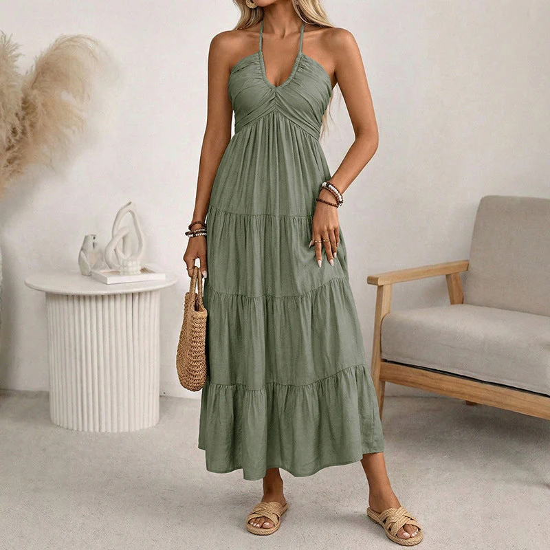 Robe longue dos nu à col halter avec drapés fluides