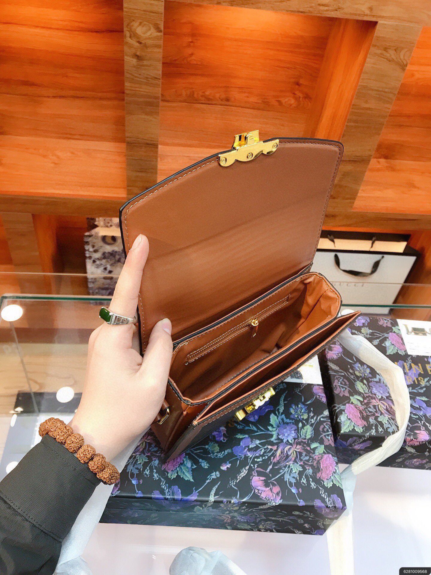 CLASSIQUE TRIOMPHE BAG IN TRIOMPHE CANVAS AND CALFSKIN TAN