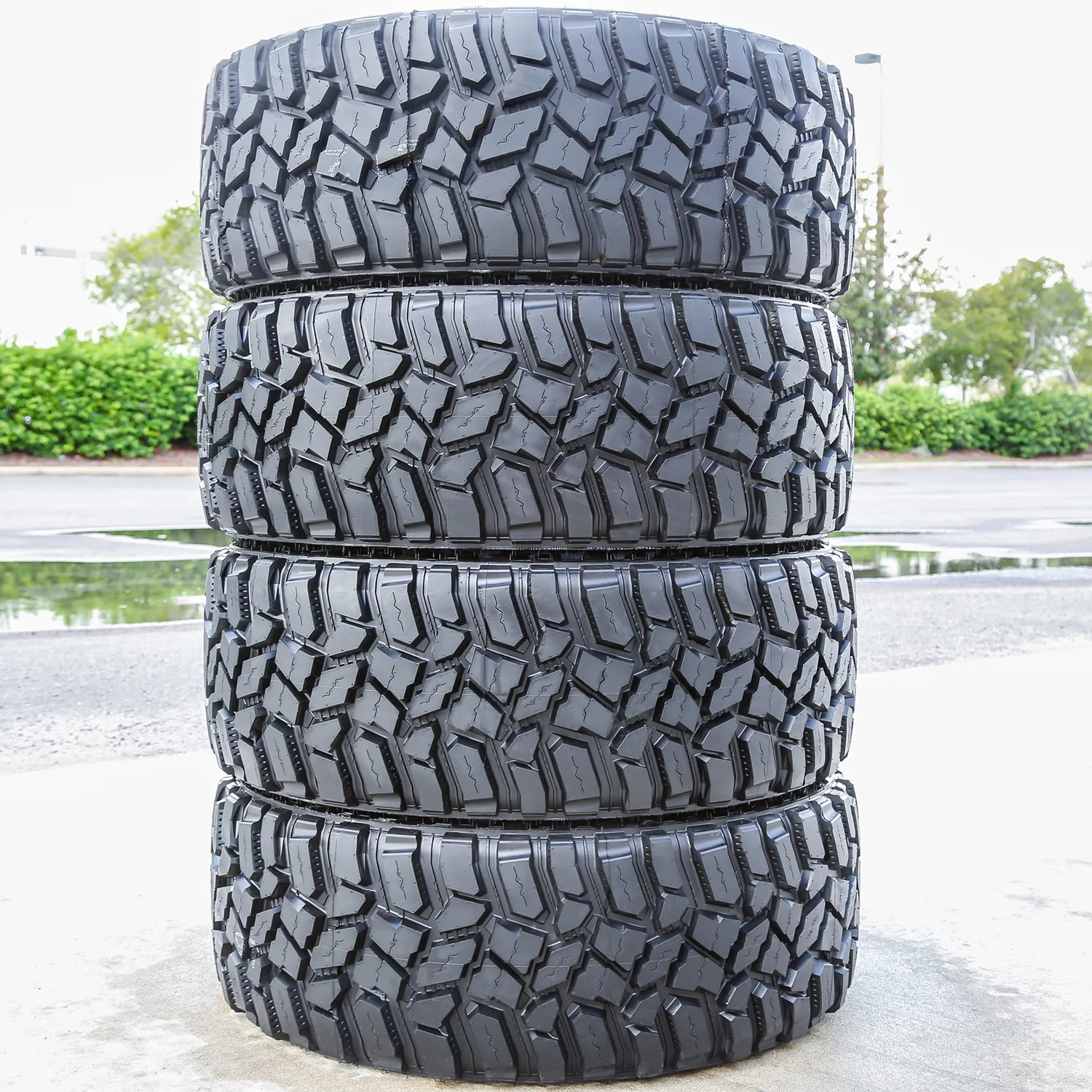 Set of 4 Cooper Discoverer STT Pro 315/70R17 121/118Q E 10 Ply M/T Mud Light Truck Tires
