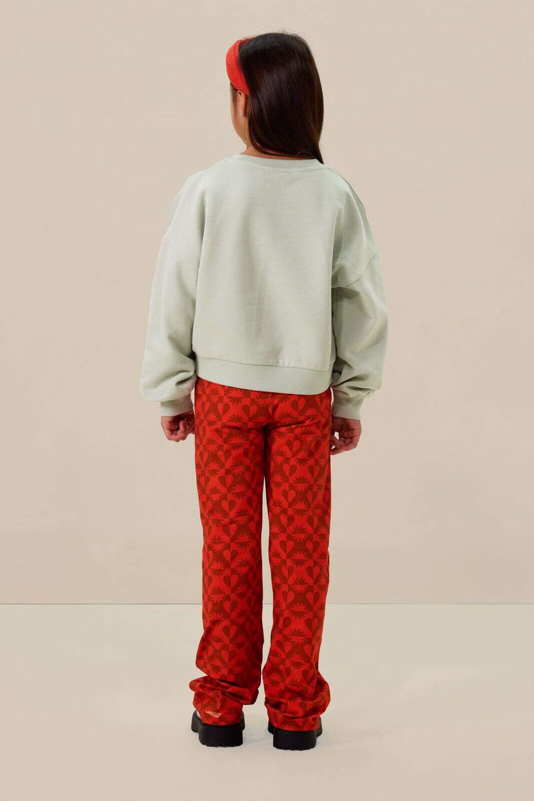 Lichtgroene sweater met tekst