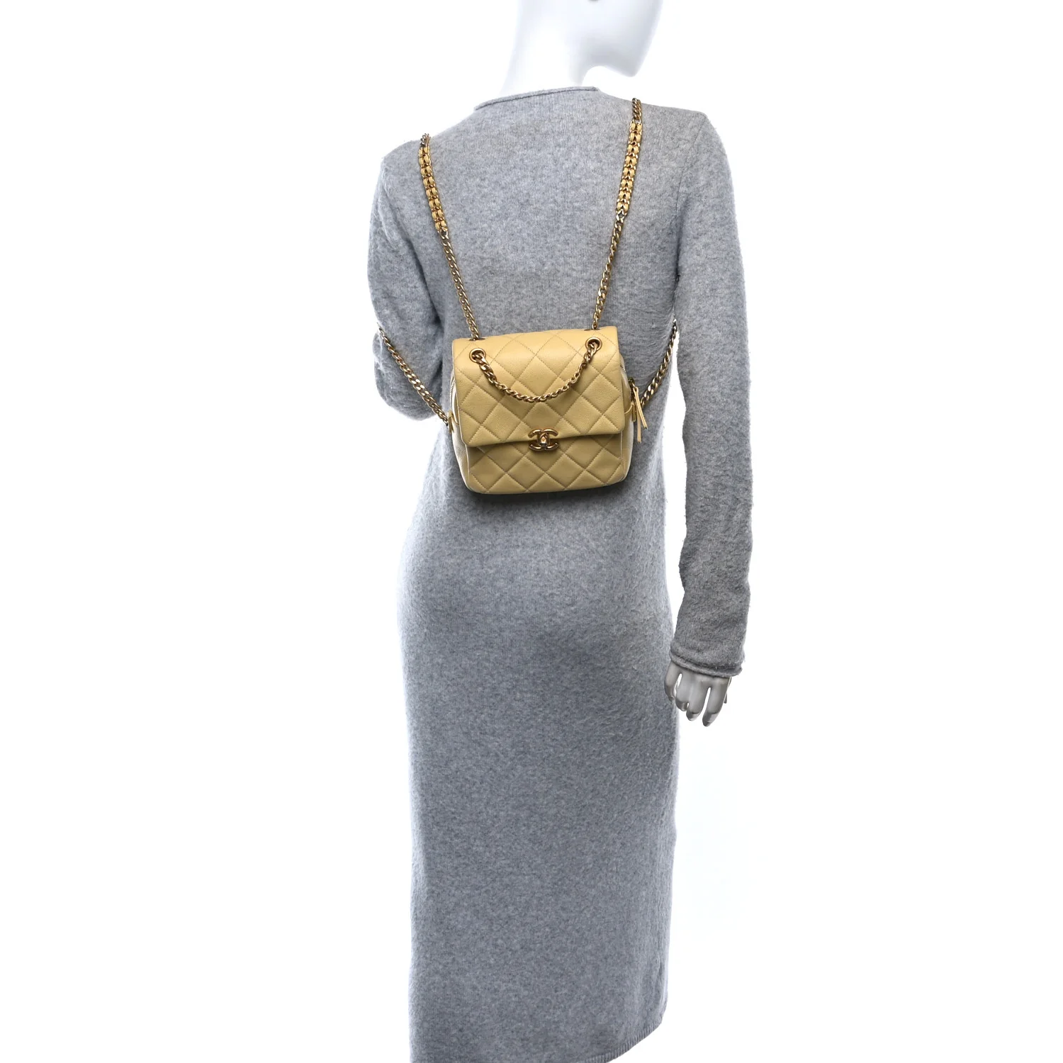 Shiny Caviar Quilted Chain Melody Backpack Yellow