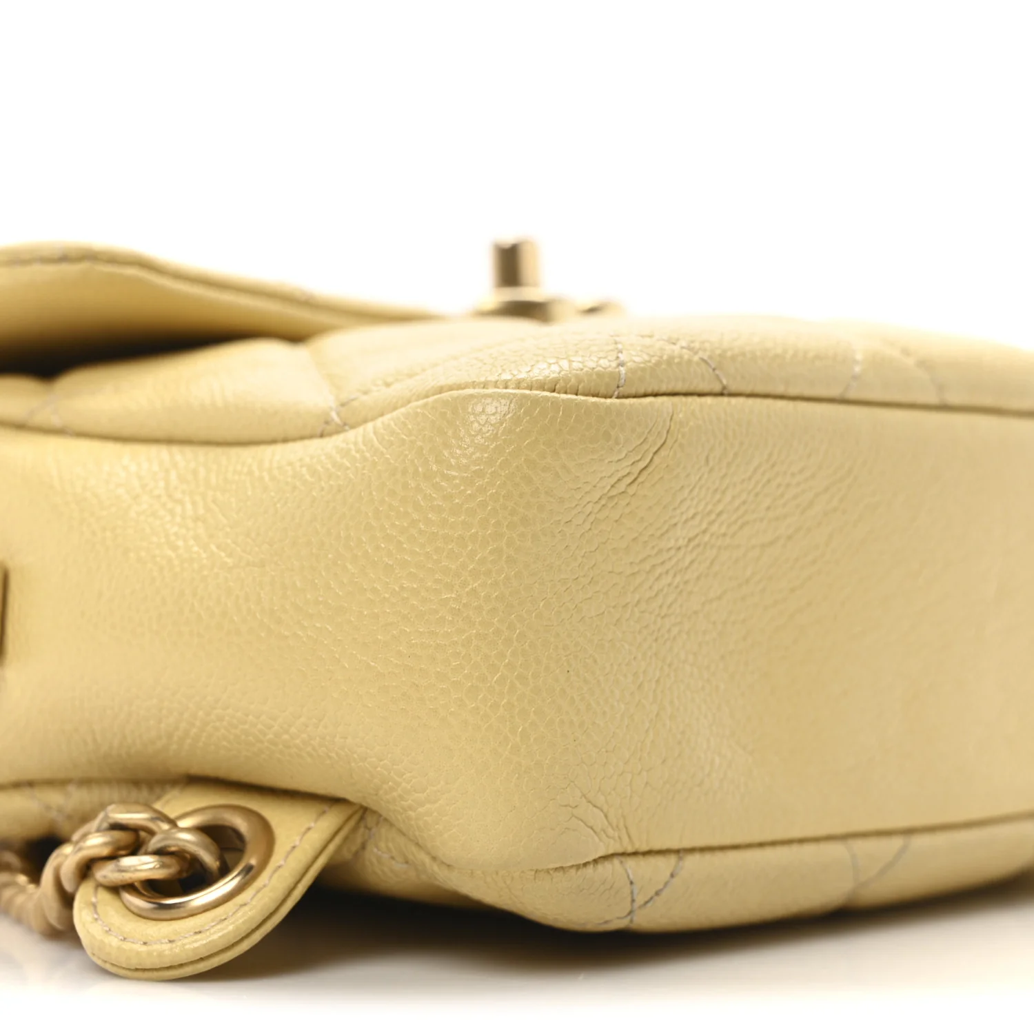 Shiny Caviar Quilted Chain Melody Backpack Yellow
